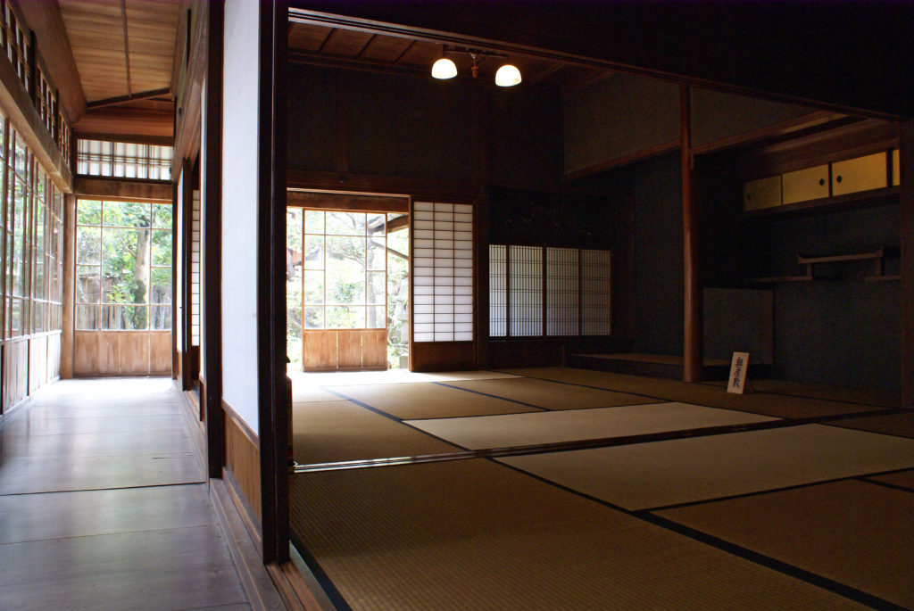 A tatami room surrounded by paper shōji.